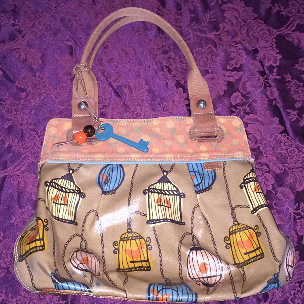 Fossil Key-Per bird cage purse.